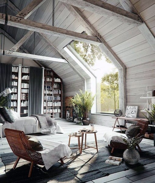attic barn bedroom bookshelf chairs large window 
