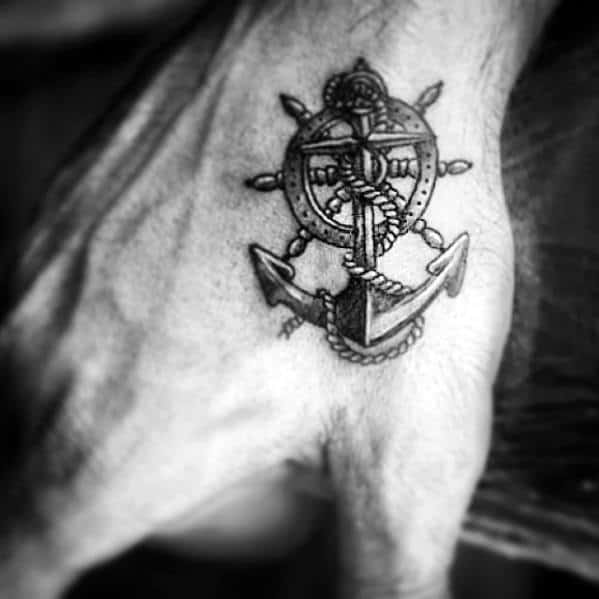 Awesome Anchor With Ship Wheel Small Mens Hand Tattoo Ideas