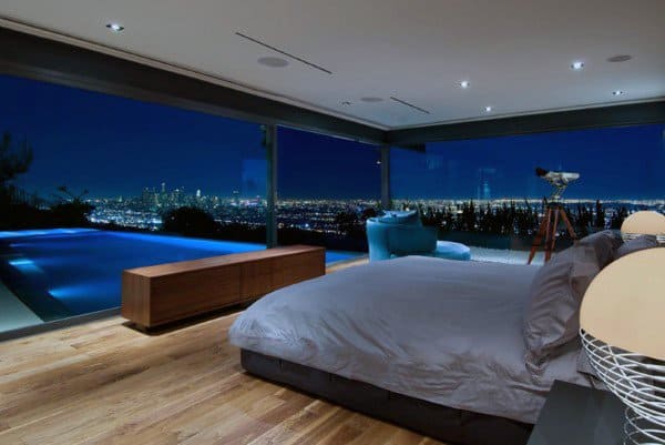 overlooking bedroom with full glass window