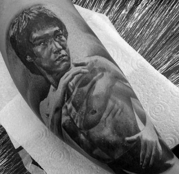 Awesome Black And Grey Ink Realistic Bruce Lee Tattoos For Men