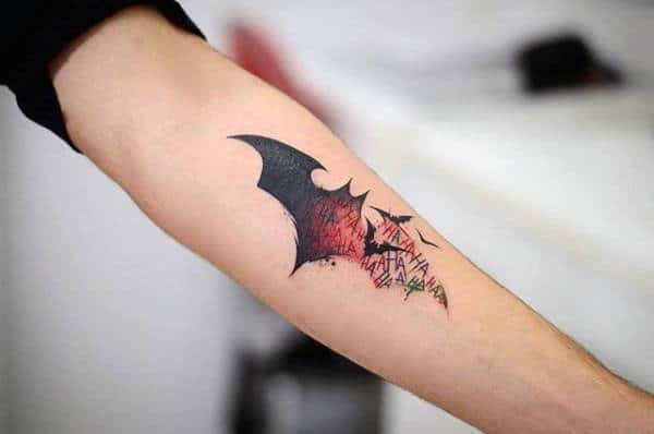 Awesome Black And Red Ink Male Forearm Tattoo Of Batman Symbol