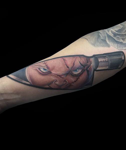 Awesome Chucky Blade Outer Forearm Tattoos For Men