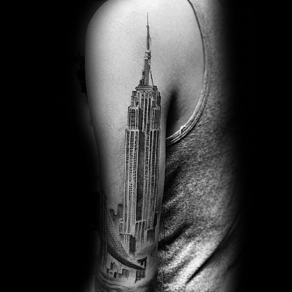 Single needle Empire State Building tattoo