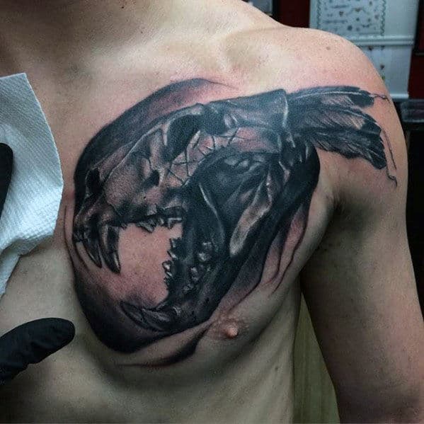 Awesome Feather Lion Skull Male Chest Tattoo