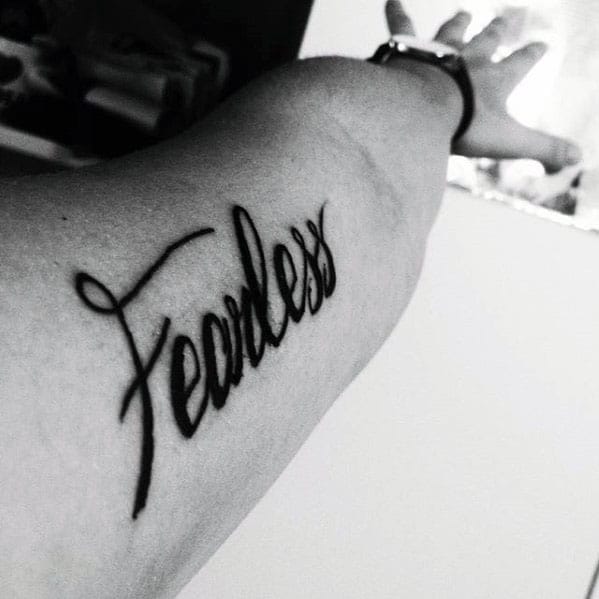 we're all mad here. | Fearless tattoo, Tattoo fonts, New tattoos