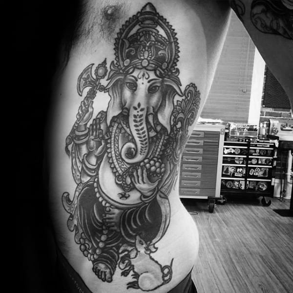 Awesome Ganesh Male Rib Cage Side Tattoo Design Ideas