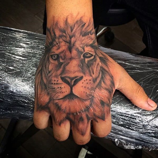 Awesome Guys Lion Tattoo Design On Hand