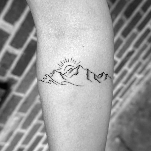 Bavaria Tattoos - - La Bella Adormentata - Serena had the beautiful idea to  get the silhouette of her hometown mountain range. So happy you chose us to  realize this fine piece.