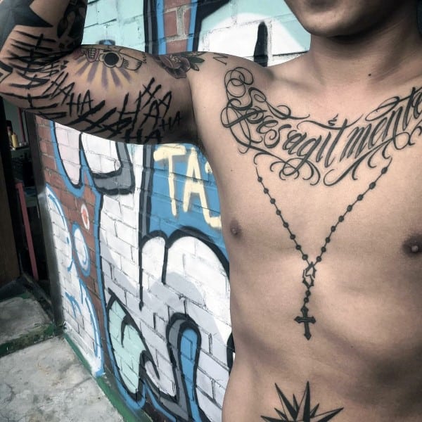 Awesome Script Tattoo On Males Chest
