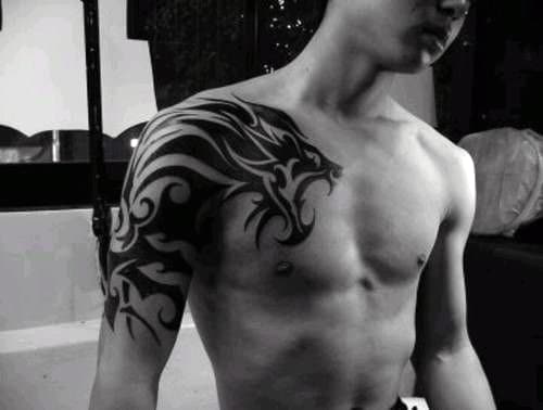 Awesome Tribal Lion Male Tattoos On Chest With Half Sleeve Design