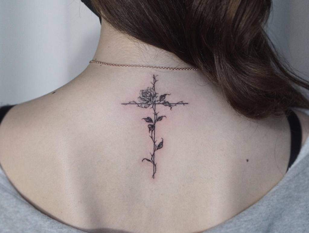 back cross tattoos for women tattooist_ara_black