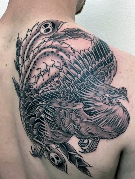 Back Guy's Phoenix Rising From The Ashes Tattoo