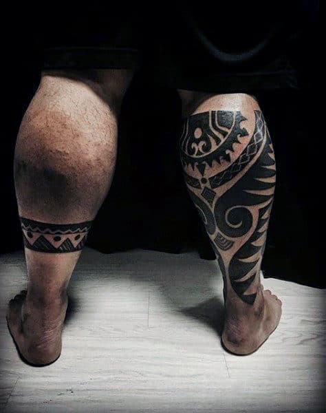 Back Of Leg Maori Themed Tattoos For Guys