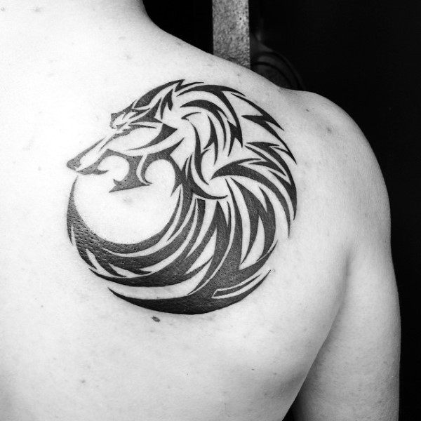 Back Of Shoulder Male Tribal Wolf Tattoo With Circular Design