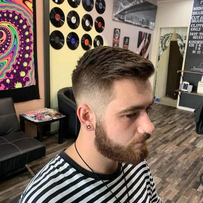 Medium forward-combed haircut with a fade