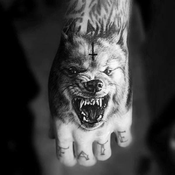 Badass Agressive Wolf Hand Tattoo Ideas For Men