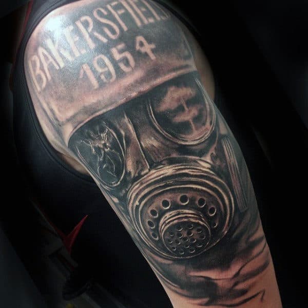 Bakersfield 1954 Gas Mask Tattoo On Arm Of Man