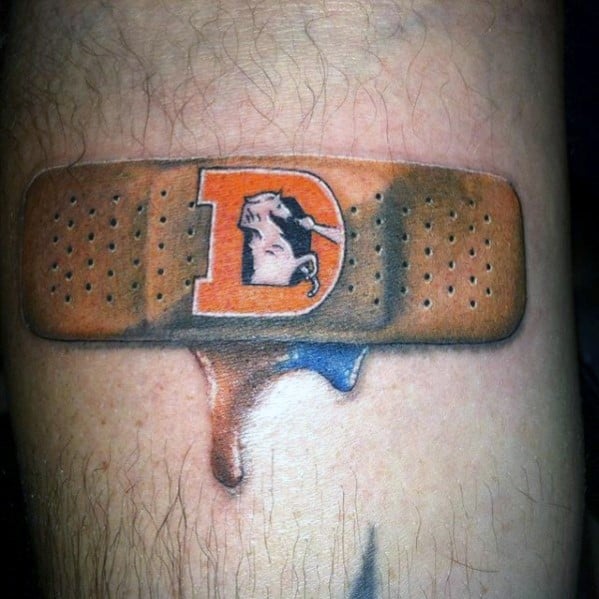 Bandaid Denver Broncos Guys Football Themed Small Tattoo On Leg