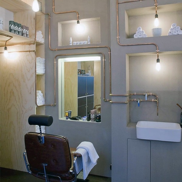 Barber Shop Design With Copper Piping One Walls