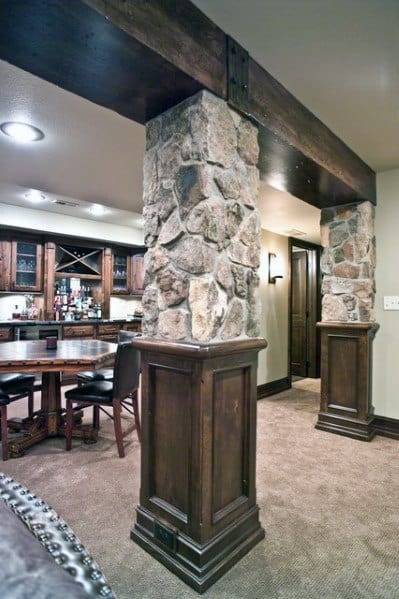 stone and wood basement support pole