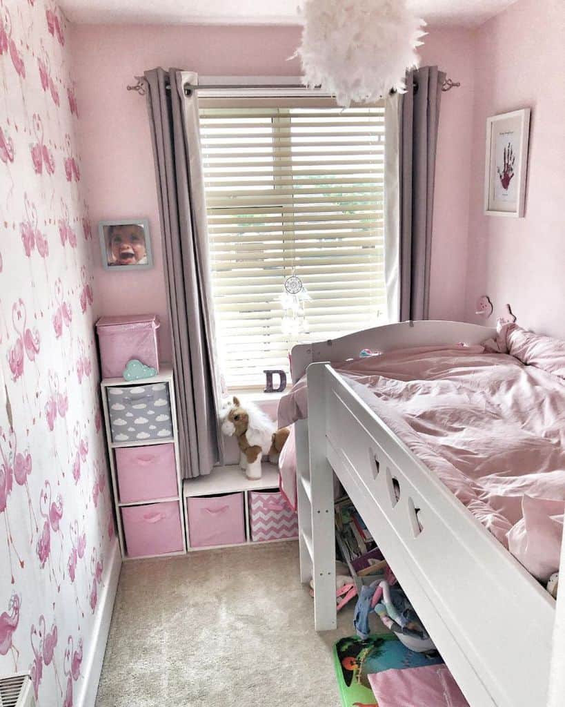 pink bedroom under bed and bin storage 