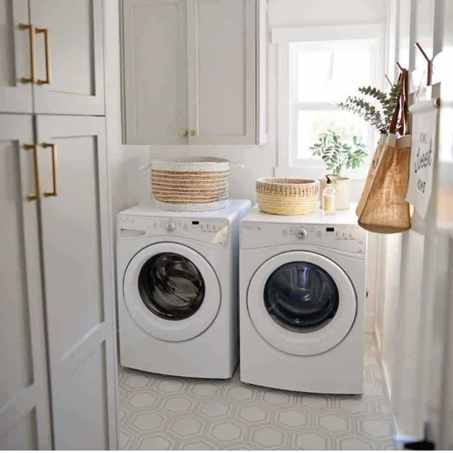 white cabinet laundry washer and dryer