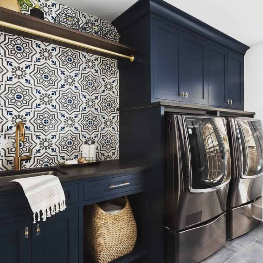 blue cabinet laundry pattern tile wall washer and dryer