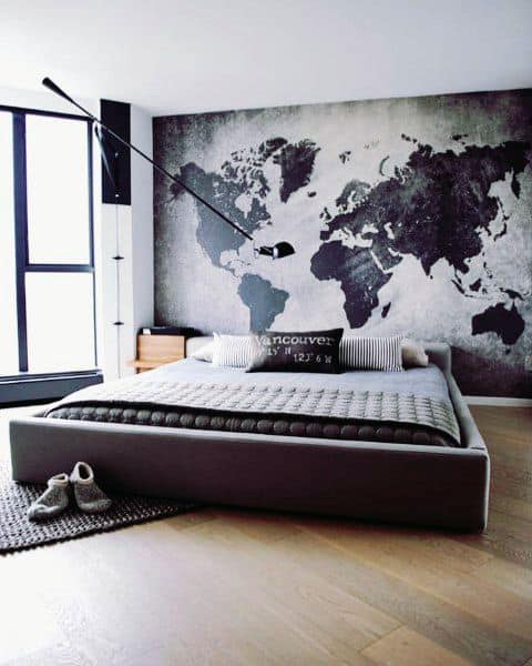 large grey modern bedroom apartment with world map wall mural 