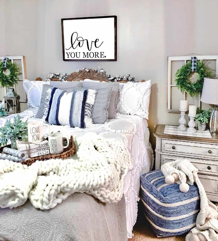 rustic farmhouse bedroom ideas white bed cabinet dresser candles white throw rug wall art sign 