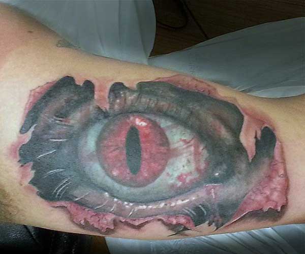Bicep Eyeball Ripped Open Skin Tattoos For Males