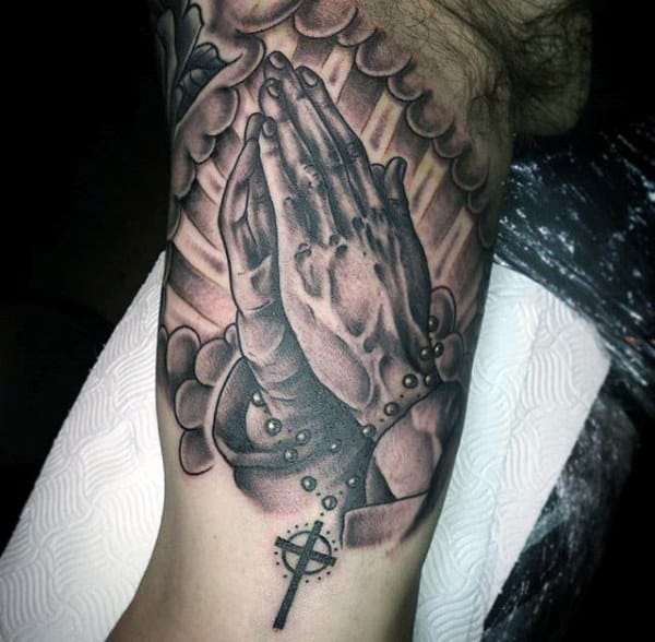 Bicep Praying Hands And Cross Tattoo For Men