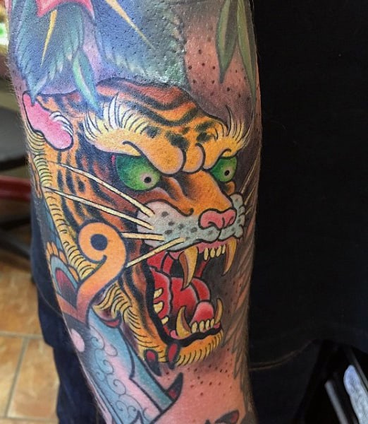Bicep Tiger Claw Tattoo For Men
