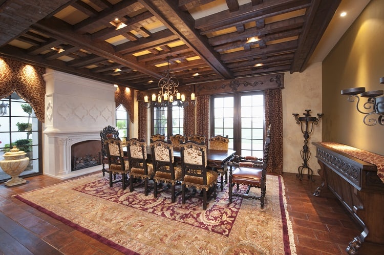 classic dining room fireplace wooden beam ceiling