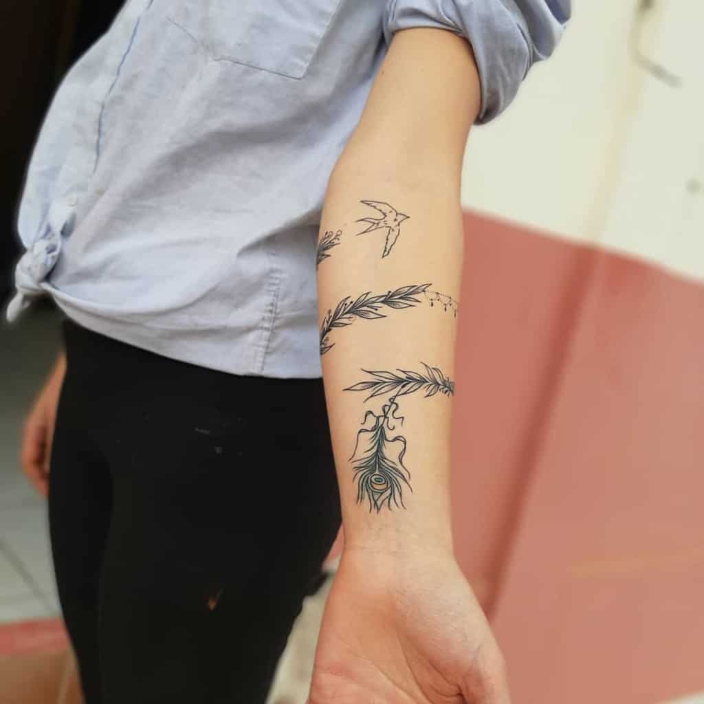 Feather Tattoo Designs and Their Meanings Culture  Religion