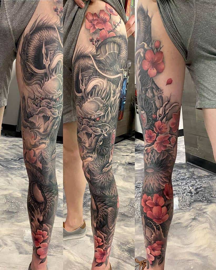 black-and-gray-realism-dragon-leg-sleeve-tattoo-graphix6