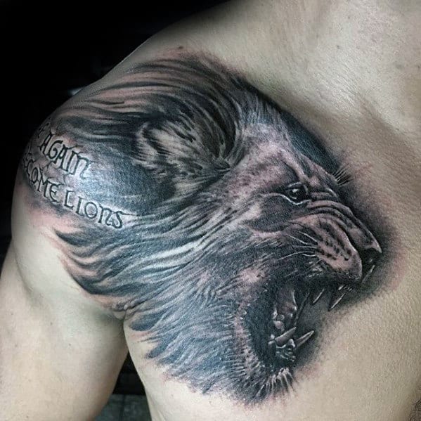 Black And Grey Guys Lion Shoulder Tattoo