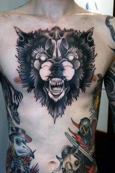 Black And Grey Ink Wolf Chest Tattoo With Old School Design On Male