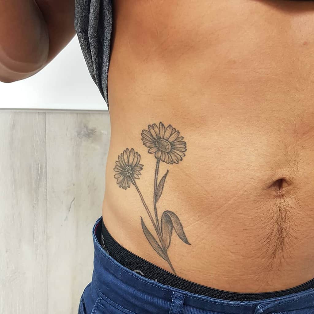 Stomach tattoo black and grey men’s daisy