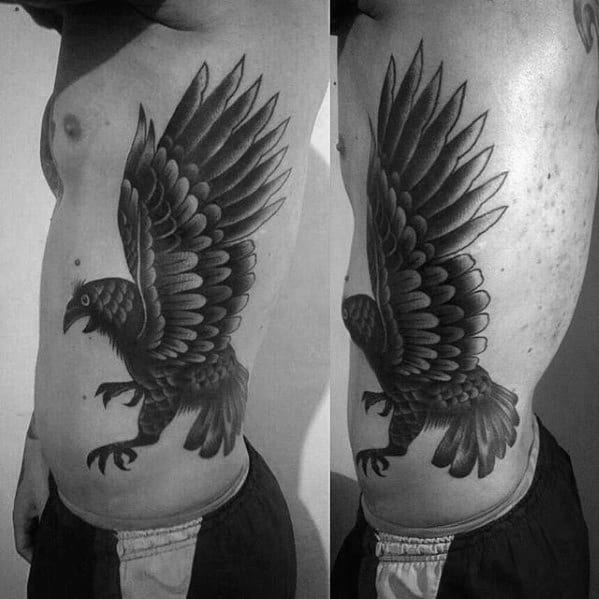 Black And Grey Shaded Male Traditional Crow Full Rib Cage Side Tattoos