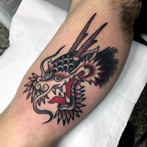 Black And Red Ink Traditional Dragon Inner Arm Bicep Tattoos For Guys