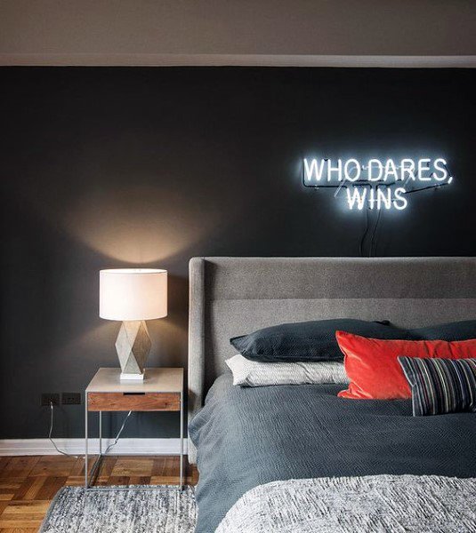 black bedroom with LED decor