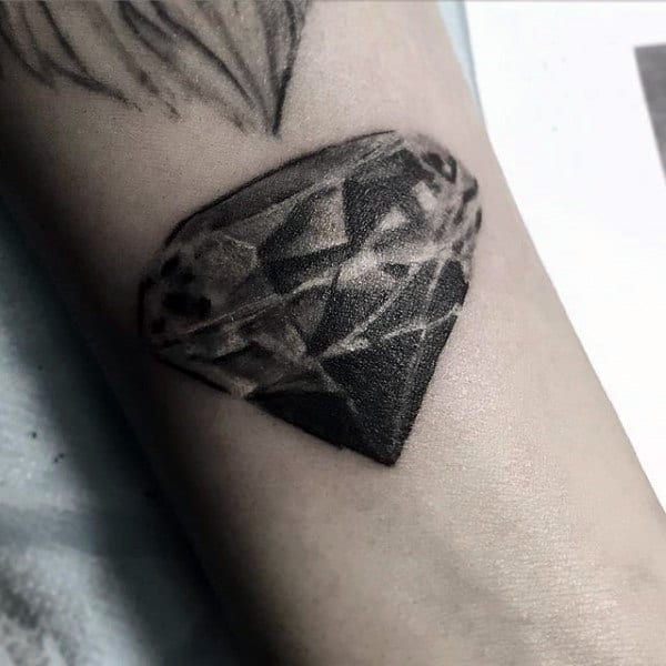 Tiny diamond wrist tattoo