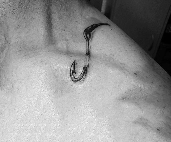 Black Fish Hook Poking Through Skin Of Shoulder Mens Tattoos
