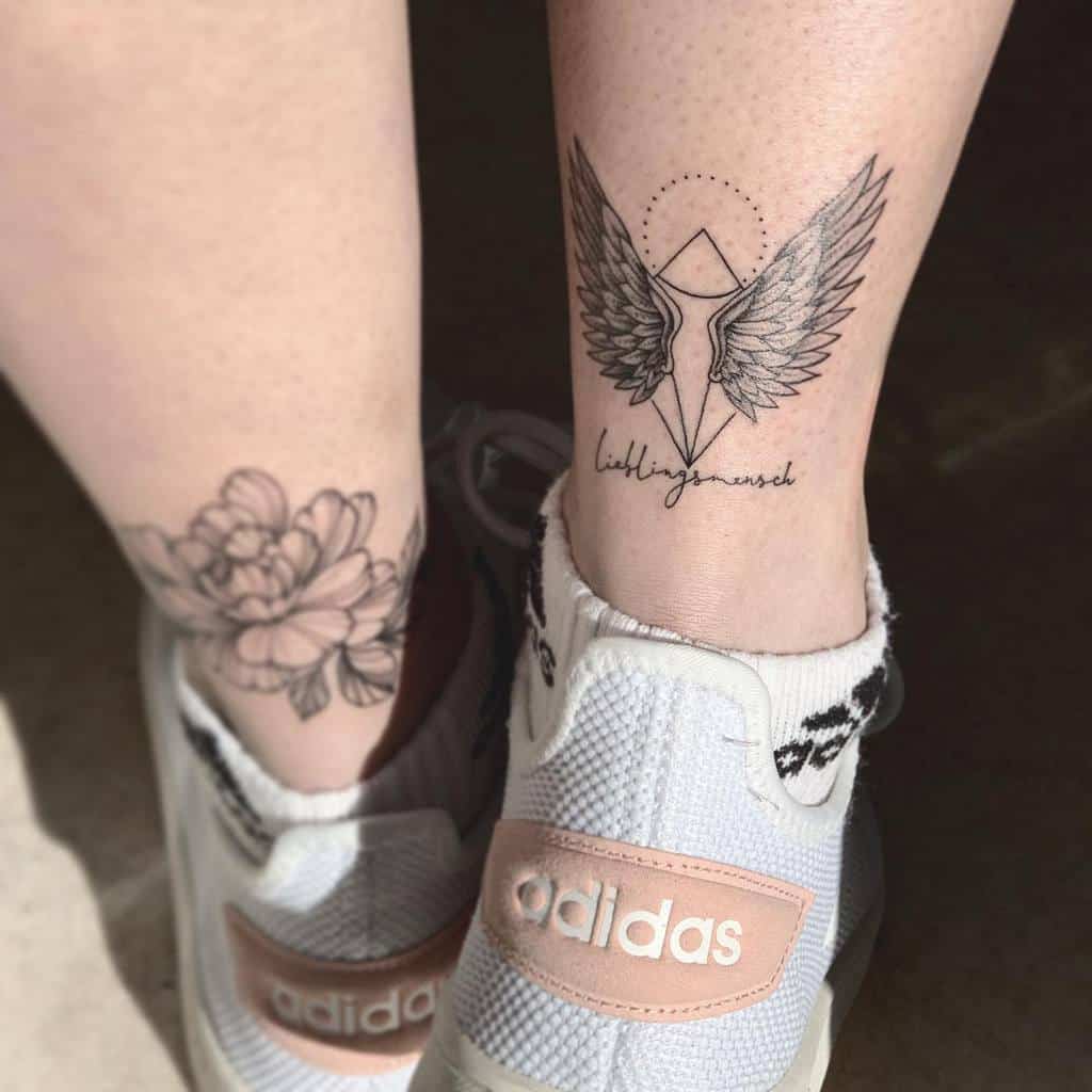 black-grey-angel-wing-tattoo-miarttattoo