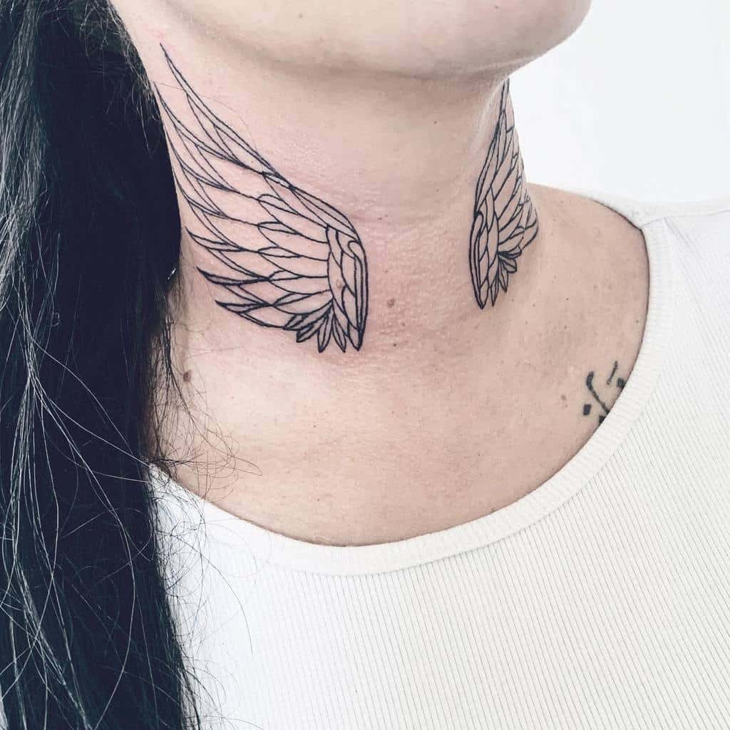 black-grey-ink-angel-wing-tattoo-miarttattoo