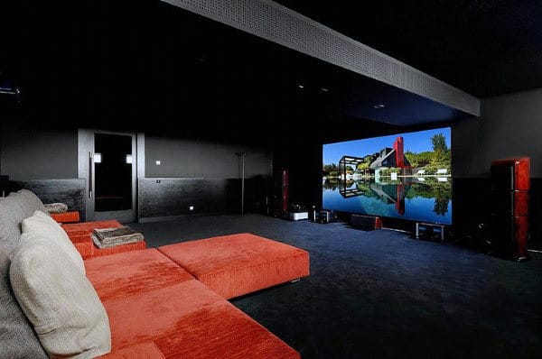 Black Home Theater With Red Couch