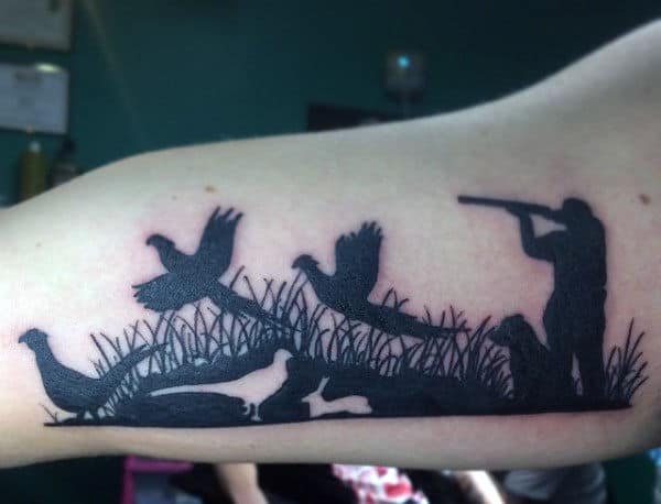 Black Hunting Themed Tattoo For Men On Bicep