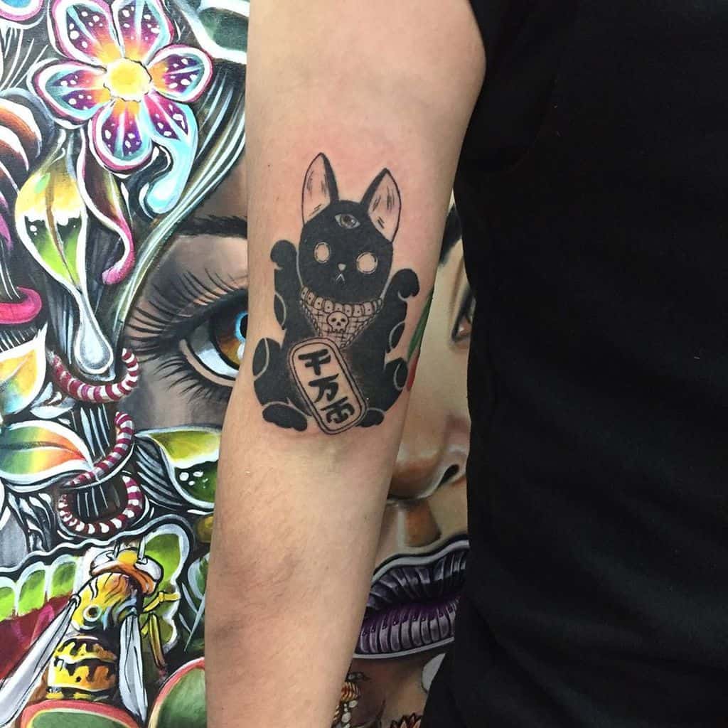 Black Ink Cat Tattoo