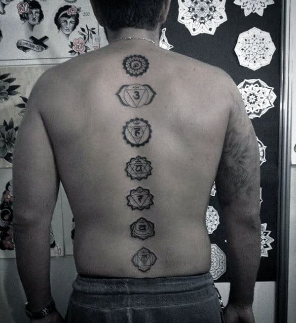 Black Ink Chakras Male Spine Tattoo Designs