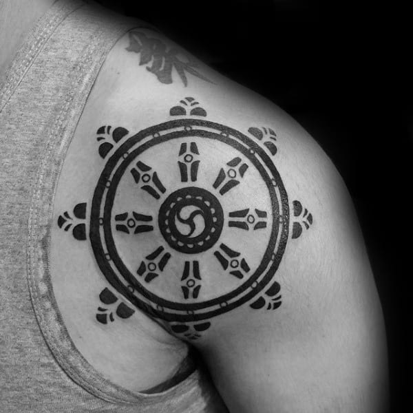 Black Ink Dharma Wheel Mens Shoulder Tattoo Ideas